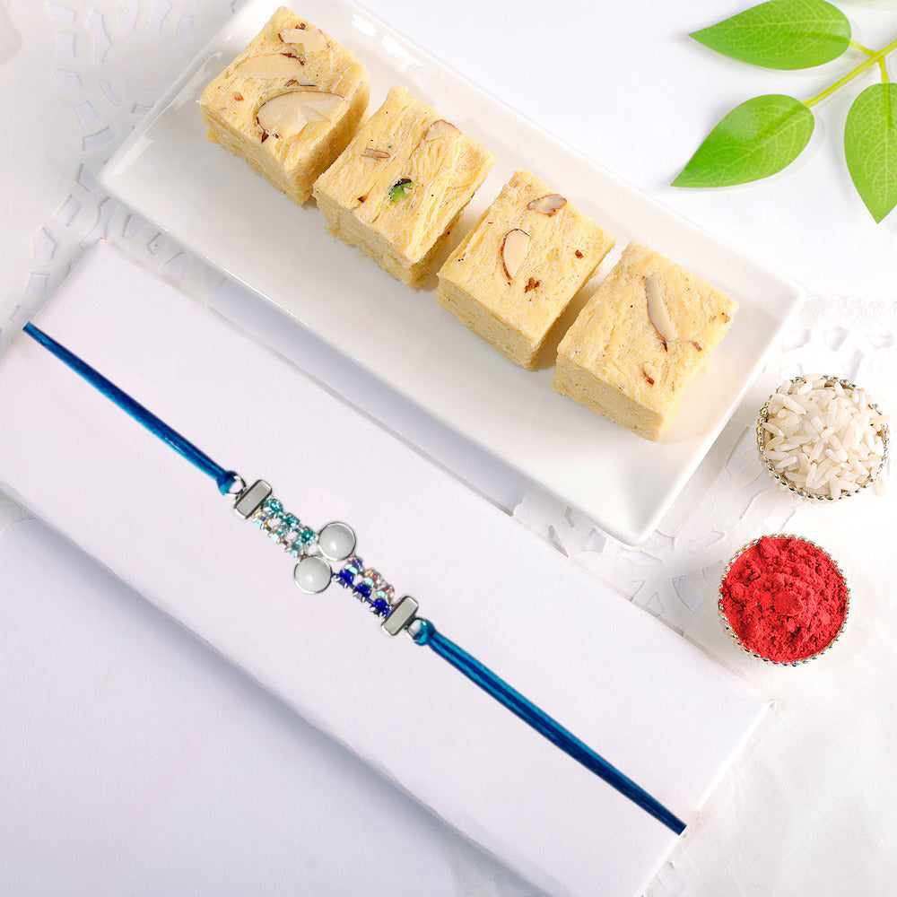 Sacred Bond Premium Rakhi Combo with Desi Ghee Laddoo, Soan Papdi & Kaju Katli 200 gm