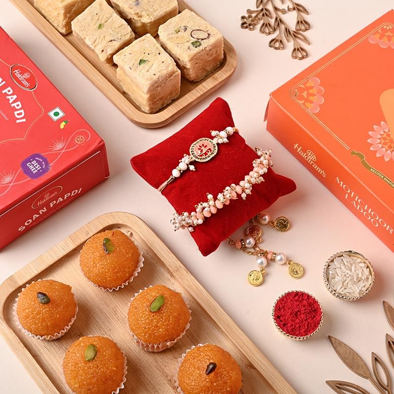 Premium Zyvia Bhaiya Bhabhi Rakhi with Haldirams Indulgent Sweets
