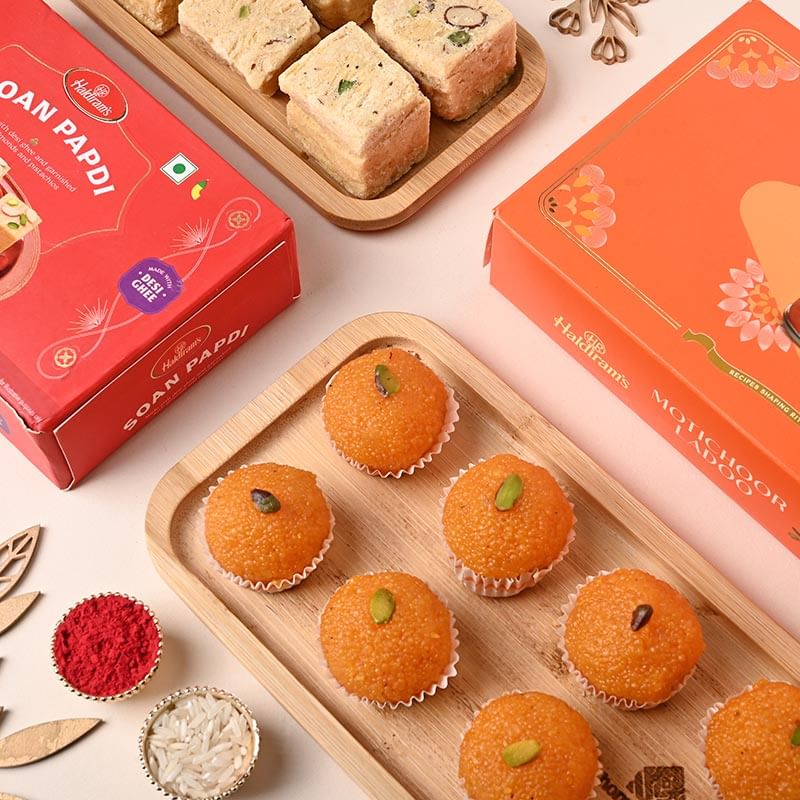Premium Zyvia Bhaiya Bhabhi Rakhi with Haldirams Indulgent Sweets